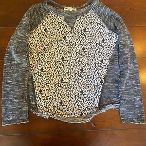 Cheetah print top with zipper accents